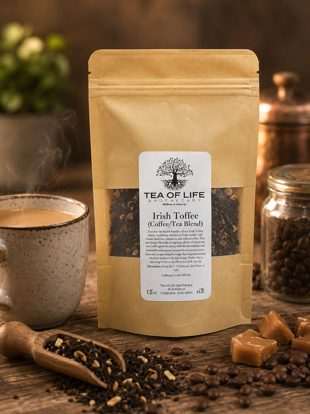 Tea of Life Apothecary Irish Toffee Coffee & Tea Blend in a kraft pouch with a creamy mug of tea and coffee, coffee beans, loose leaf tea, and toffee candies on a rustic wooden table.