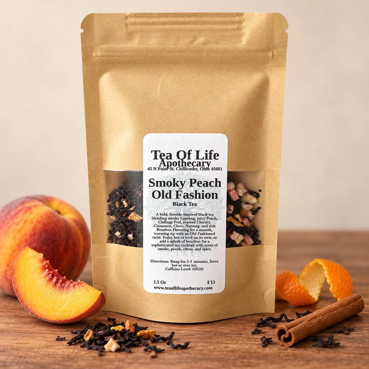 Tea of Life Apothecary Smoky Peach Old Fashion black tea pouch with peach, orange peel, cinnamon, and loose tea.