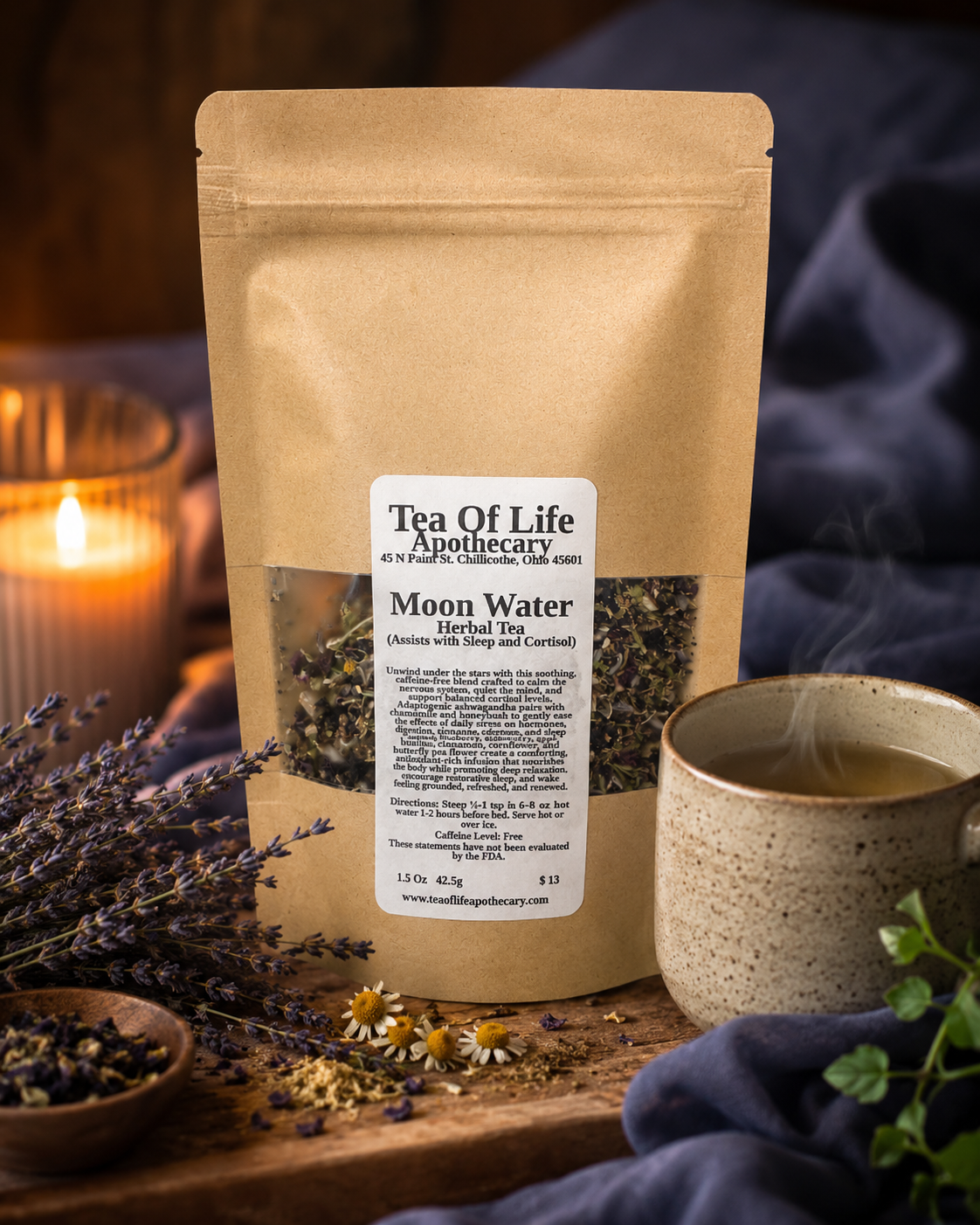 Moon Water Herbal Tea by Tea of Life Apothecary displayed beside a warm cup of tea, lavender, and calming herbs in a cozy nighttime setting designed to promote relaxation, better sleep, and cortisol balance.