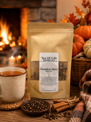 Tea of Life Apothecary Pumpkin Spice Black Tea in a kraft pouch with a steaming cup of pumpkin spice tea, cinnamon sticks, loose tea, and fall pumpkins in a cozy autumn setting.