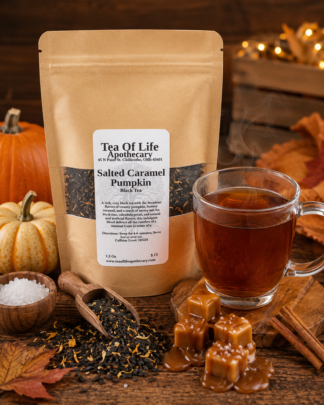 Salted Caramel Pumpkin Black Tea by Tea of Life Apothecary, a cozy loose leaf black tea with creamy pumpkin and buttery salted caramel flavor, pictured with a steaming cup of tea, pumpkins, caramel and fall spices.