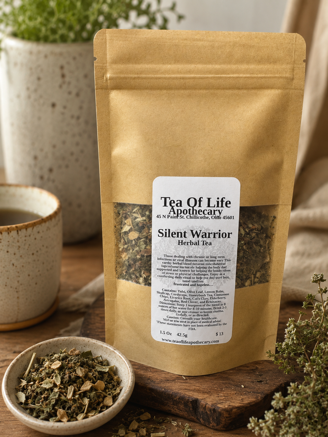 Silent Warrior Herbal Tea by Tea of Life Apothecary displayed in a rustic apothecary setting with a ceramic tea cup, loose herbal blend, and warm natural lighting, highlighting an immune and wellness support herbal tea blend.