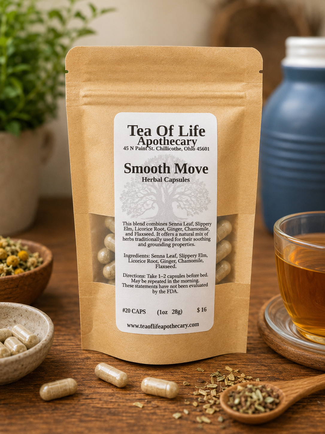 Tea of Life Apothecary Smooth Move Herbal Capsules in kraft paper pouch with natural digestive support herbs, displayed on a rustic wooden table beside herbal tea and botanical ingredients.