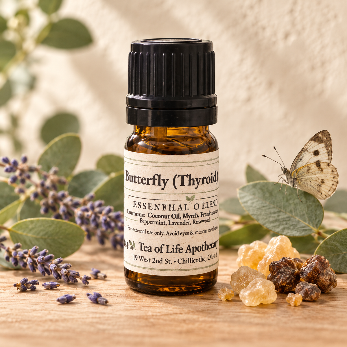 Butterfly Thyroid Support Essential Oil Blend by Tea of Life Apothecary—a 5 mL coconut oil blend with myrrh, frankincense, bergamot, peppermint and lavender.