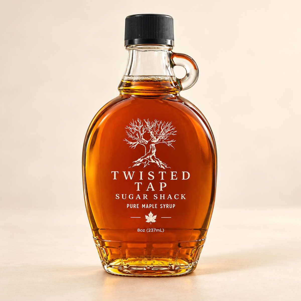 Twisted Tap Pure Maple Syrup in an 8-ounce glass bottle with a black cap and tree design.
